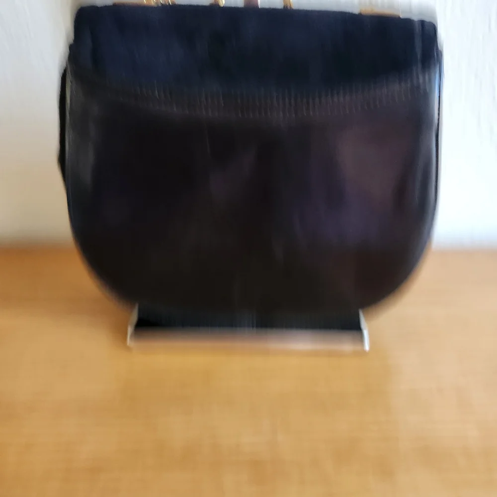 Elegant Black Shoulder Bag with Gold Accents